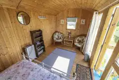 Blue shepherd's hut interior and living space
