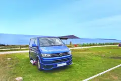 Grass pitches overlooking the sea with views of Portland