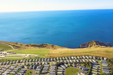 Aerial of Durdle Door Holiday Park on the Jurassic Coast with sea views