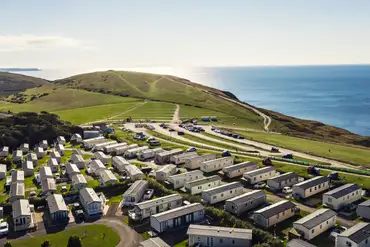 Aerial of the site and Durdle Door car park with SW Coast Path access