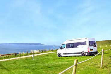 Electric grass campervan pitches with sea views