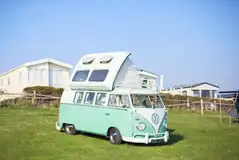 Sea view grass pitches on a slope
