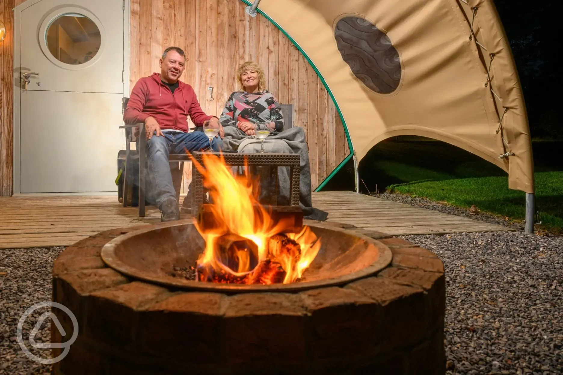 Fire pit and glamping cabin