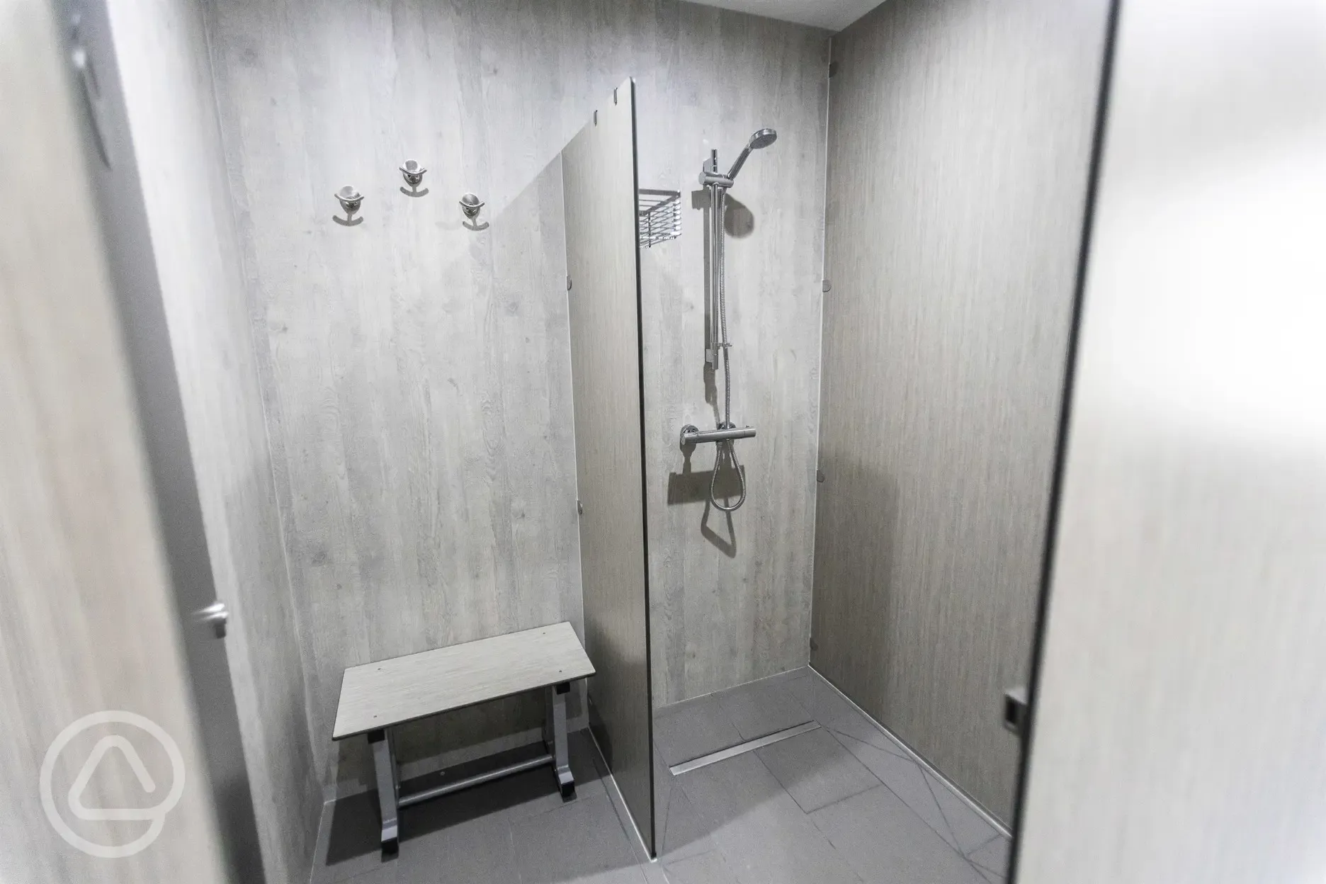 Mens shower with hooks and seating