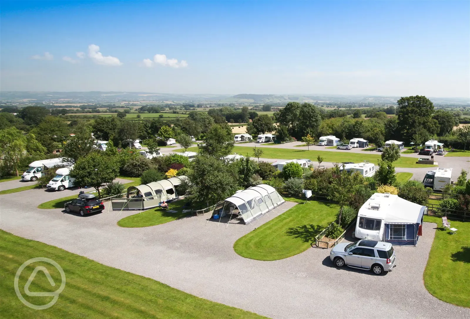 View across Top &amp; Lower Oaks - all weather pitches for tents, motorhomes, campers and caravans