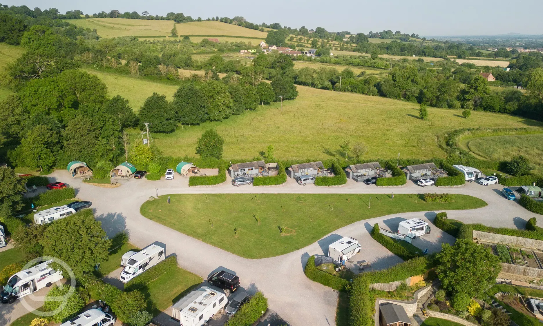 Aerial of the super pitches and glamping cabins