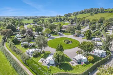 Aerial of Old Oaks Touring Park with views towards Glastonbury Tor