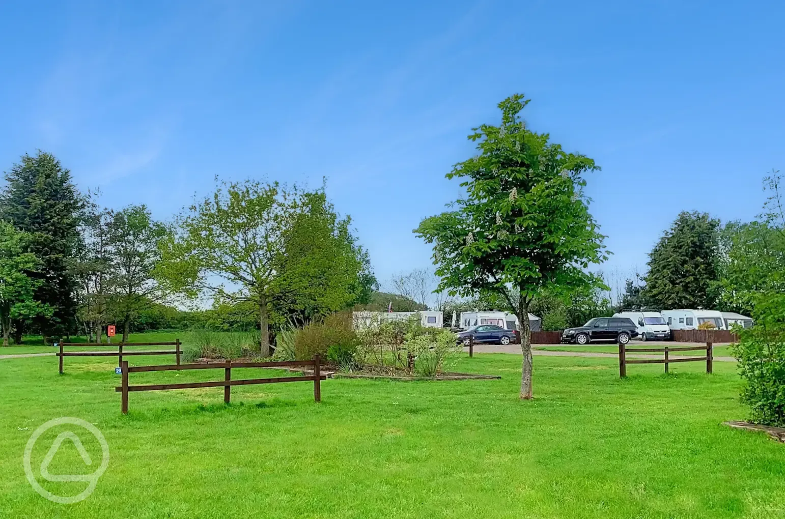 Electric grass touring pitches with fences between