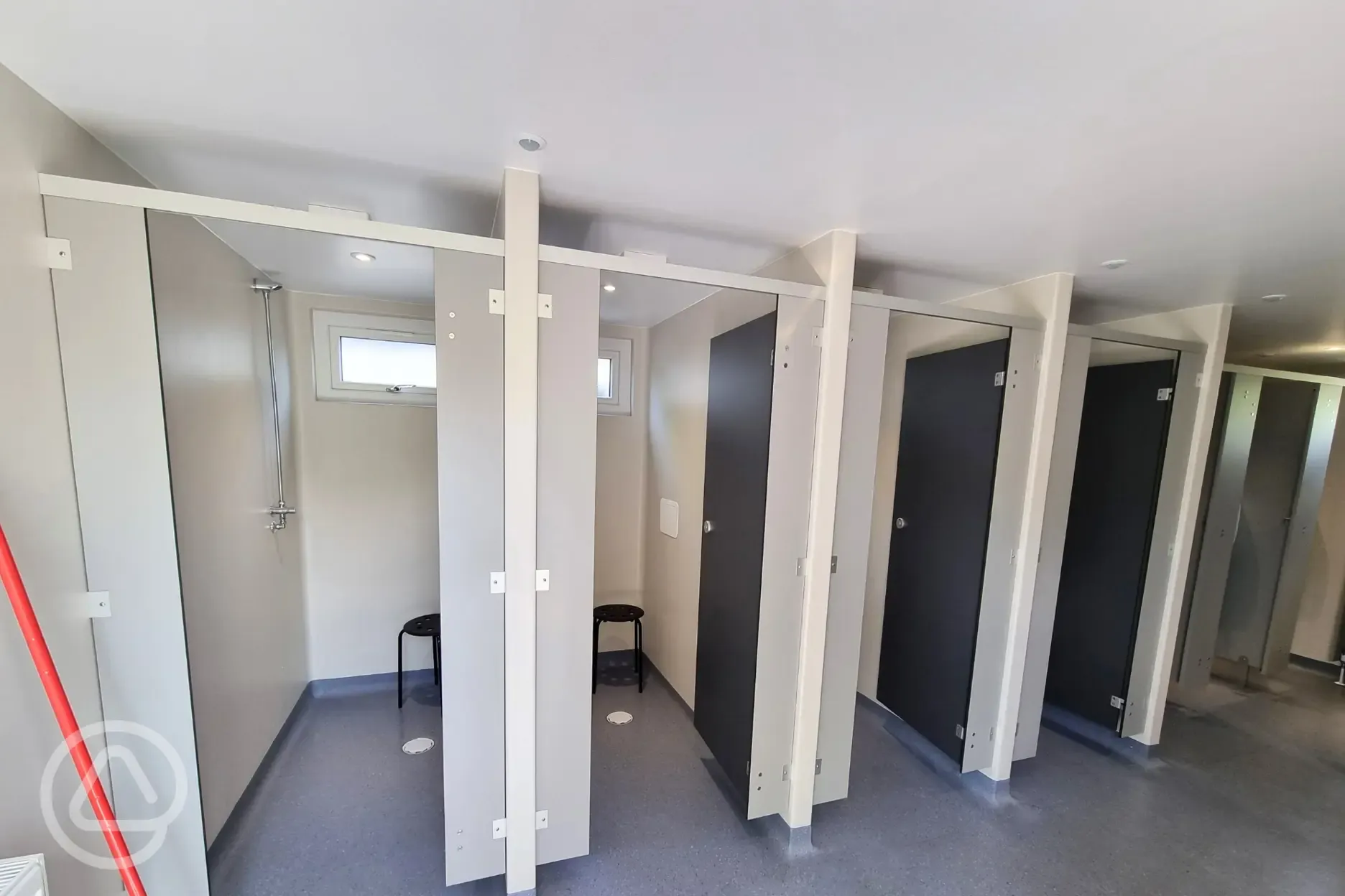 Push-button showers with stools