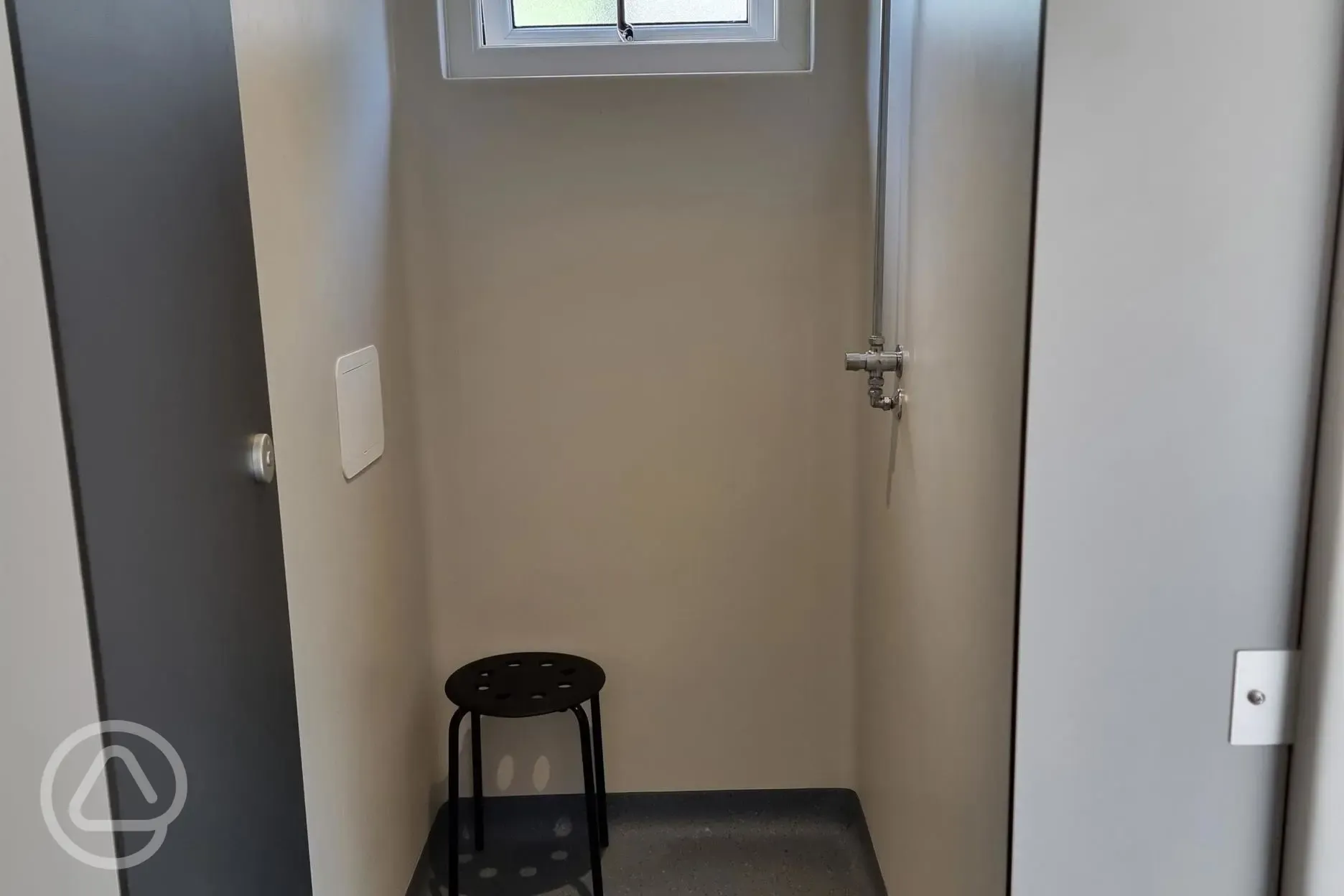 Push-button showers with a stool