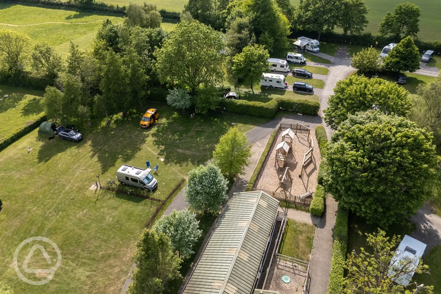 Aerial of Piccadilly Caravan Park with the facilities block and play park