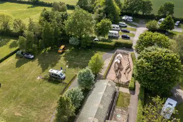 Aerial of Piccadilly Caravan Park with the facilities block and play park