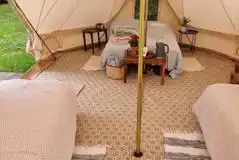 Large furnished bell tent with a double bed and up to three air beds Large furnished bell tent with a double bed and up to three air beds