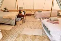 Large furnished bell tent with a double bed and up to three air beds Large furnished bell tent with a double bed and up to three air beds