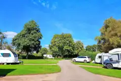 Electric hardstanding pitches with 16 amp hook ups and grass between pitches Electric hardstanding pitches with 16 amp hook ups and grass between pitches