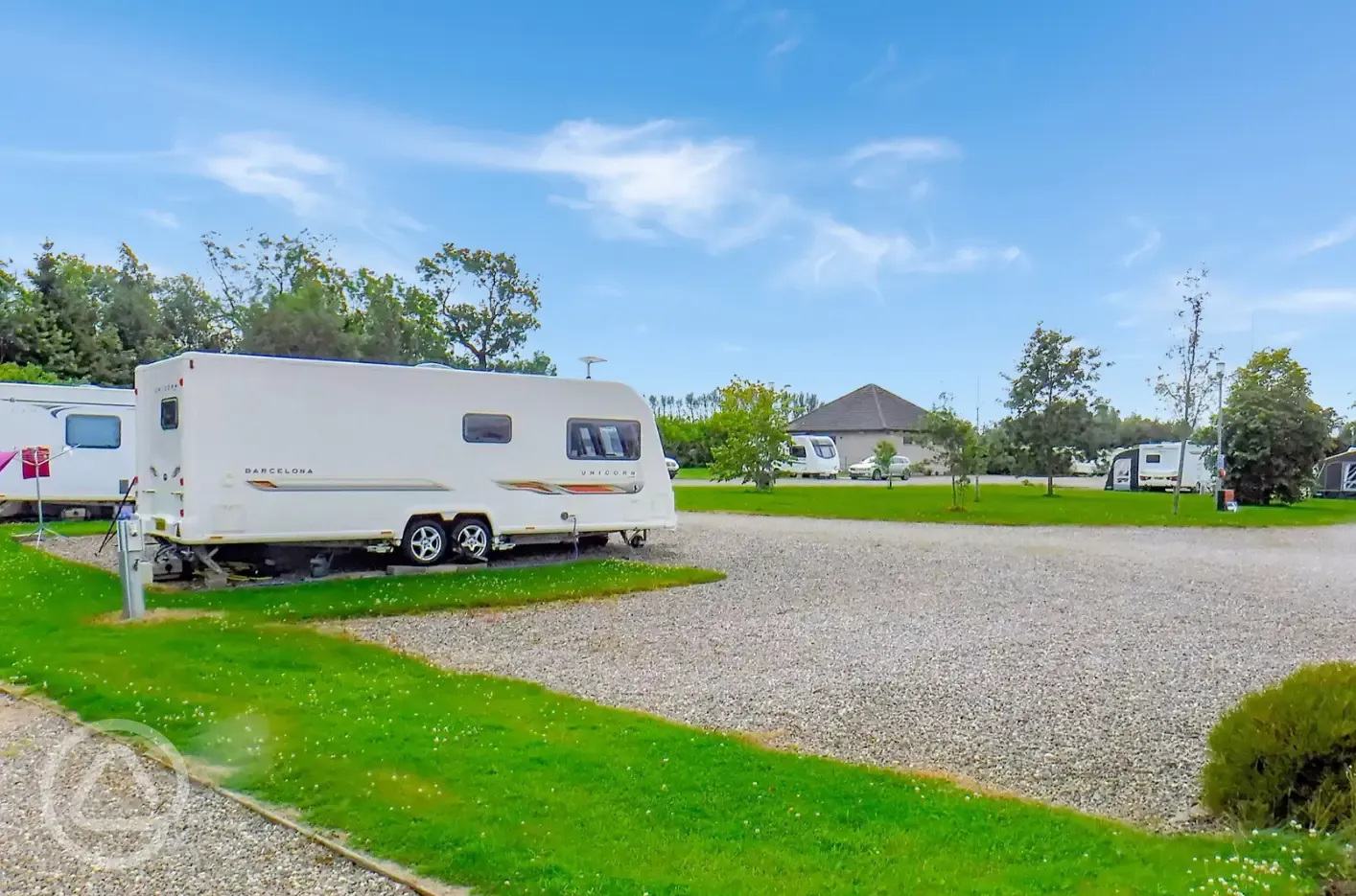 Fully serviced hardstanding touring pitches