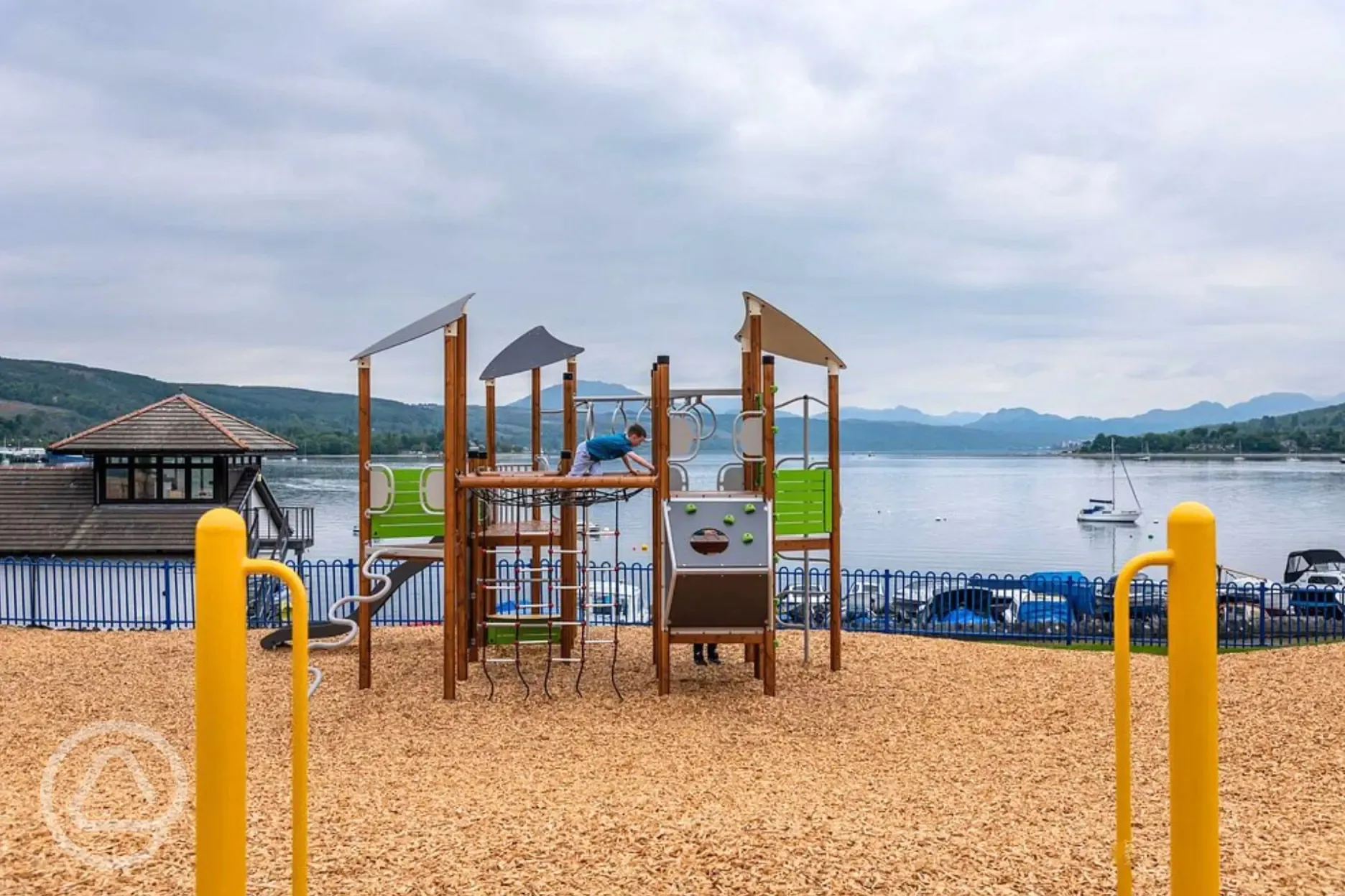 Outdoor play area with slides and climbing frames Outdoor play area with slides and climbing frames