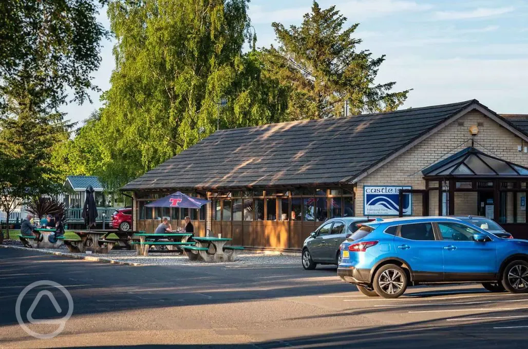 Castle Isle Inn with outdoor seating, open daily from midday Castle Isle Inn with outdoor seating, open daily from midday