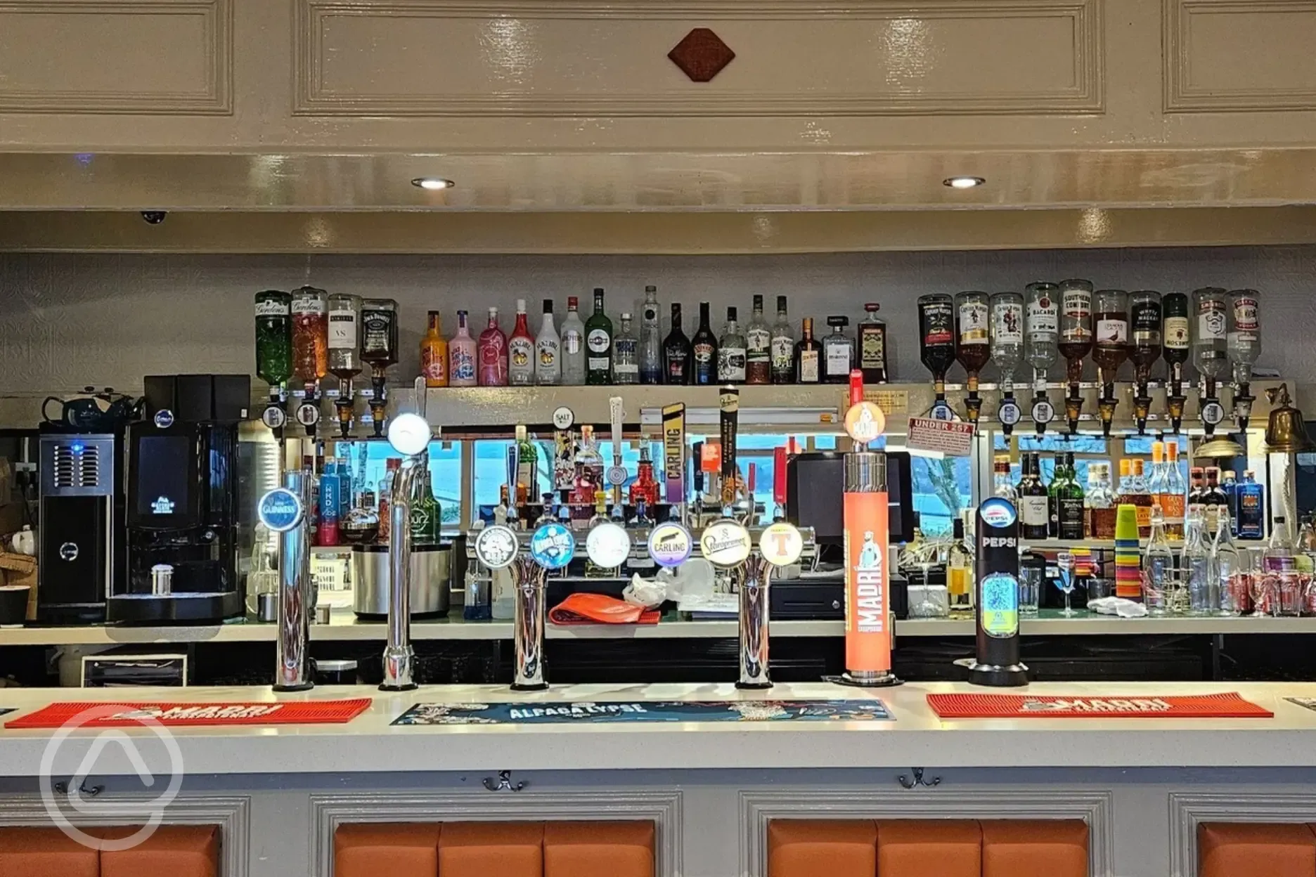 The bar serving alcoholic drinks at the Castle Isle Inn The bar serving alcoholic drinks at the Castle Isle Inn