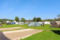 Services grass tent pitches beside the touring pitches