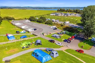 Overview of serviced grass tent pitches and hardstandings at Auchenlarie Park 