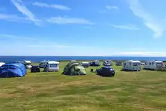 Grass pitches with sea views