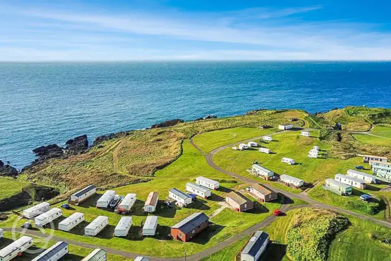 Aerial of Burrowhead Holiday Village and the coast