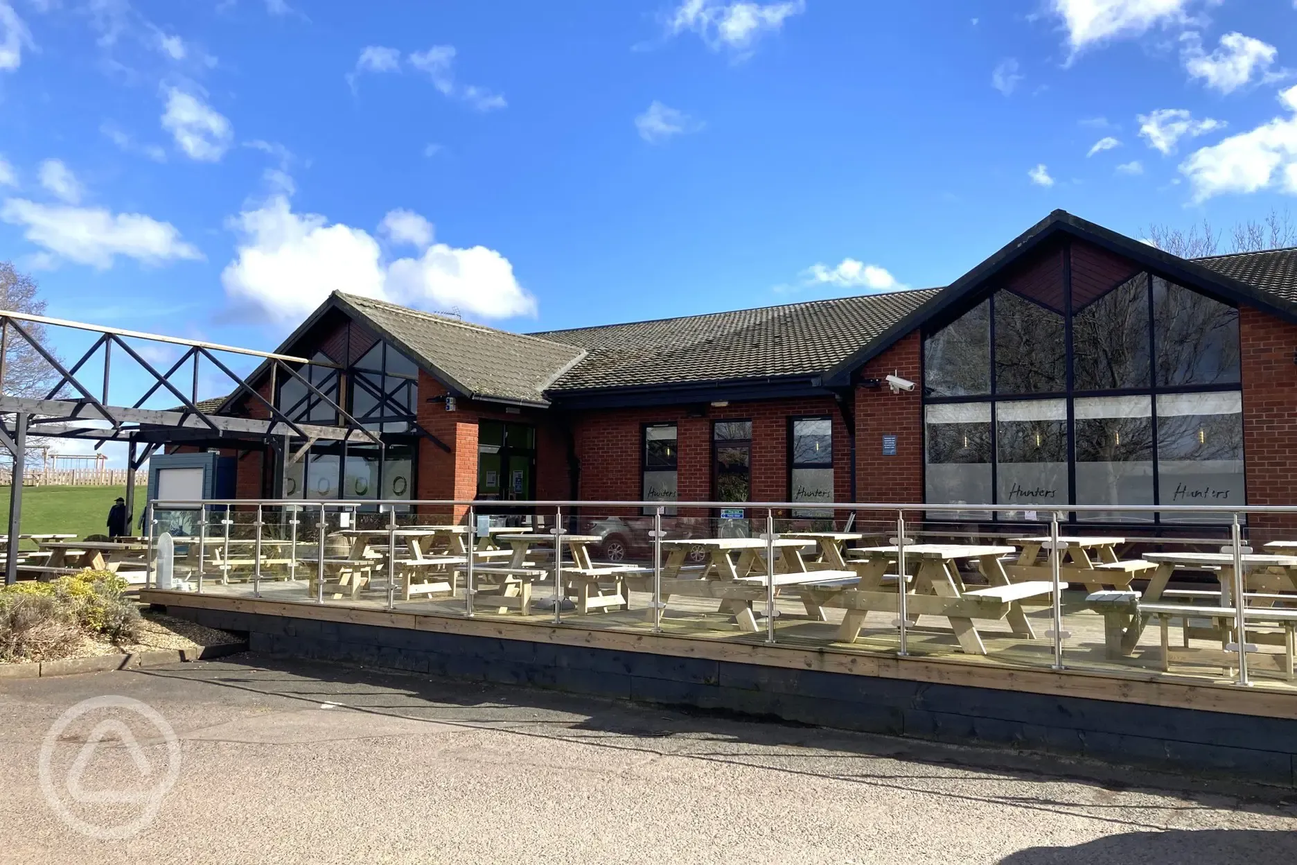 Main facilities/entertainment building with a beer garden area Main facilities/entertainment building with a beer garden area