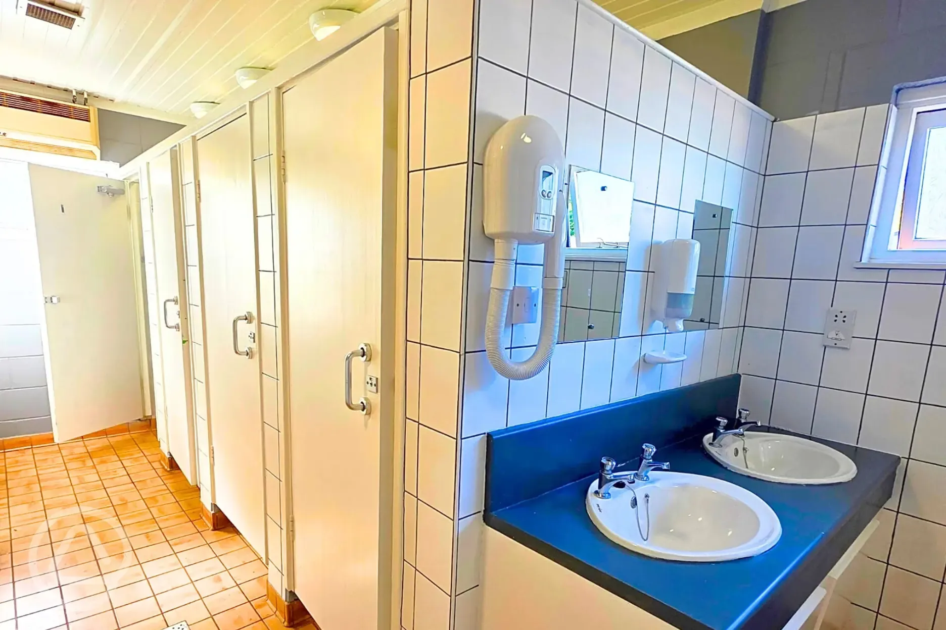 Campsite bathrooms with access to hair dryers Campsite bathrooms with access to hair dryers