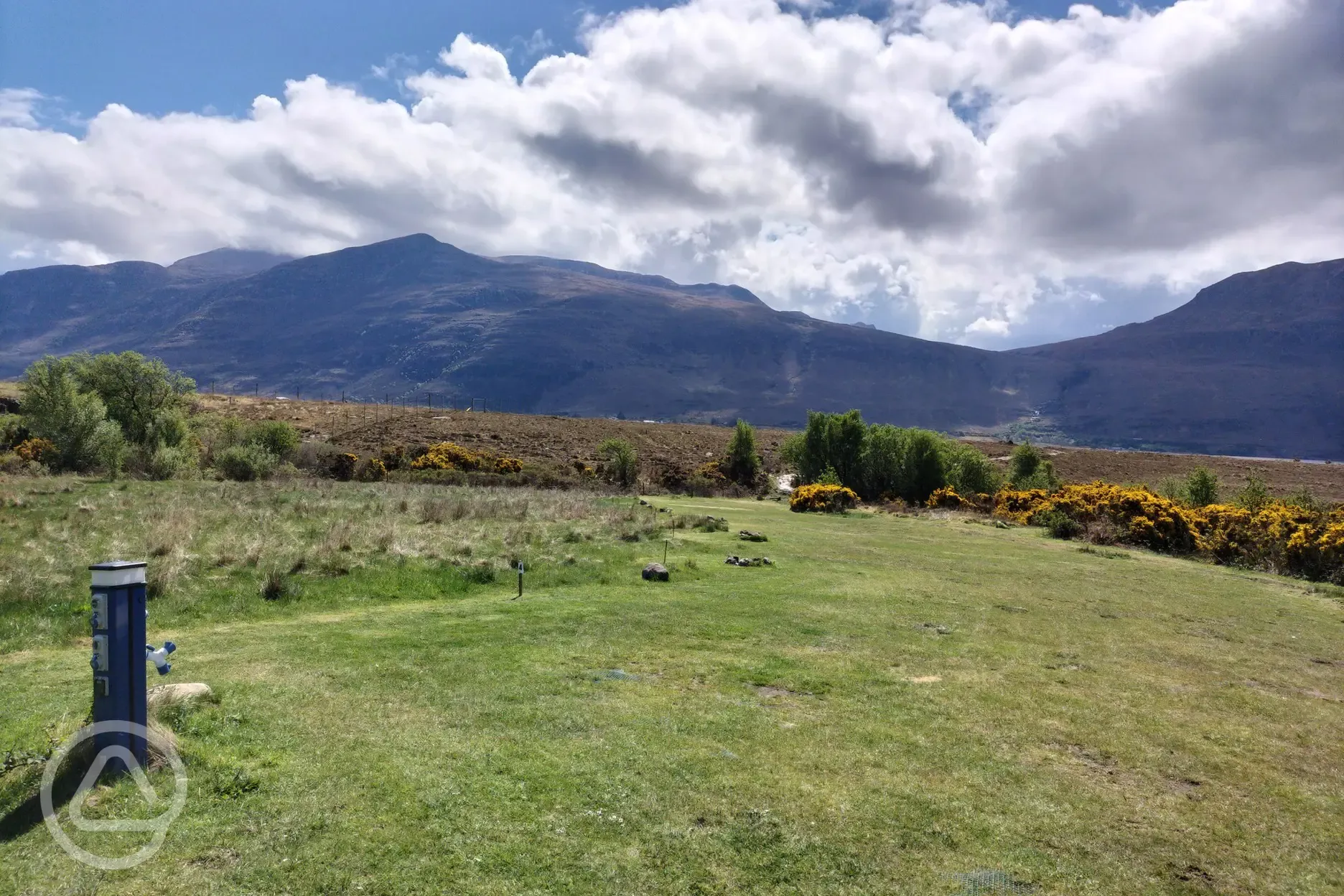 Non electric grass pitches and mountain views