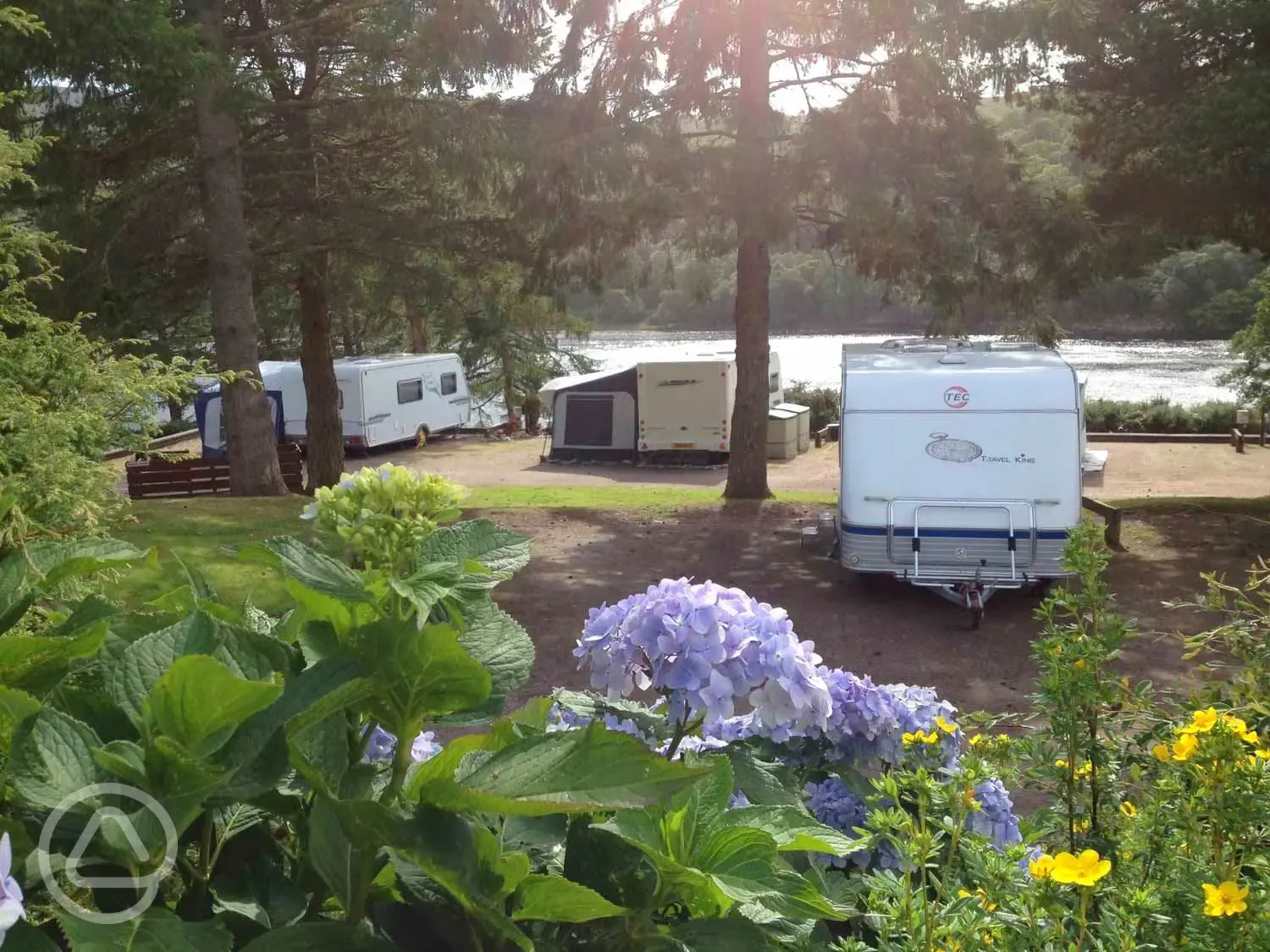 Electric hardstanding touring pitches overlooking Loch Eli