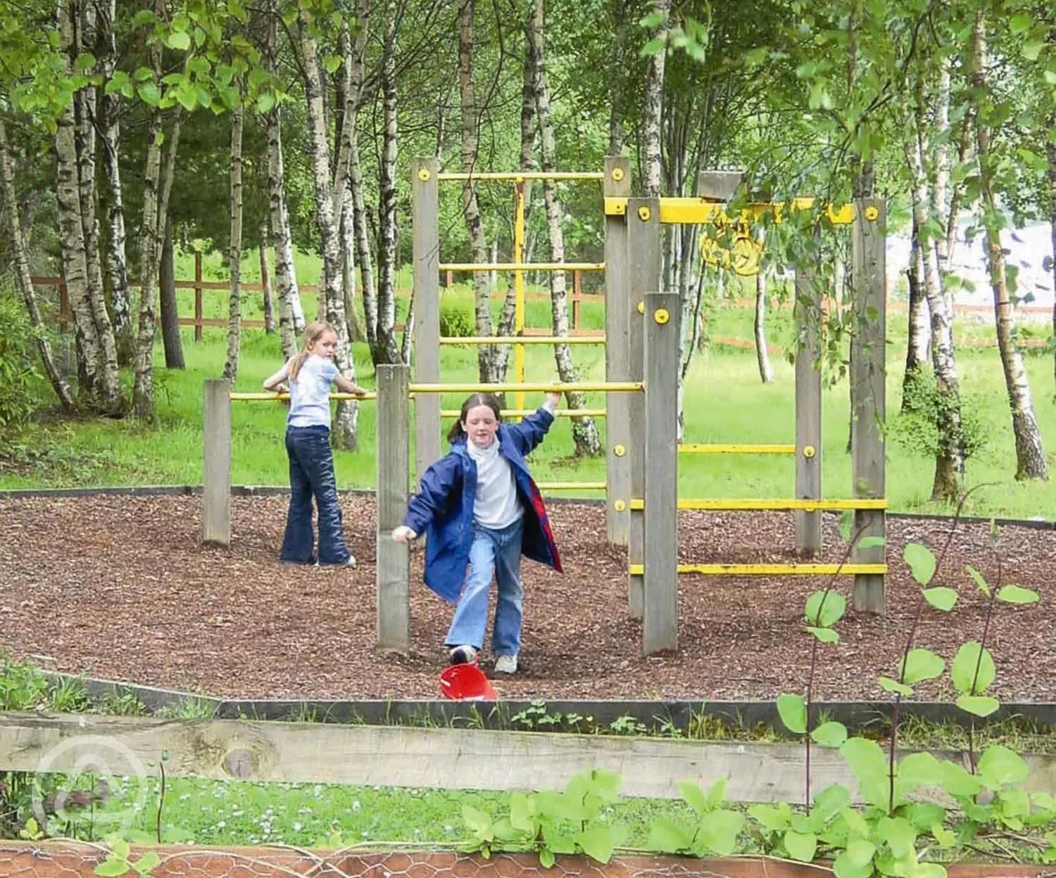 Play area with climbing frames