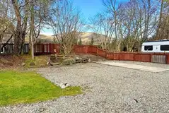 Red electric gravel and hardstanding touring pitch