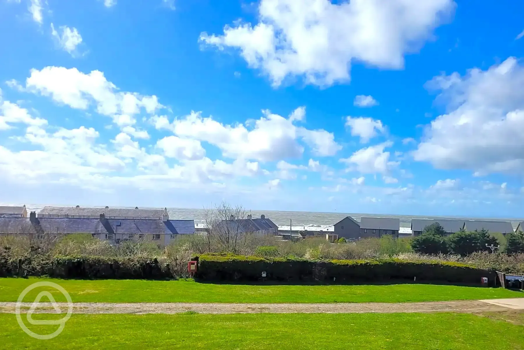 Electric grass pitches with 10 amp hook ups (5m x 8m)