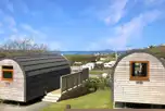 Camping pods with sea views and raised decking areas