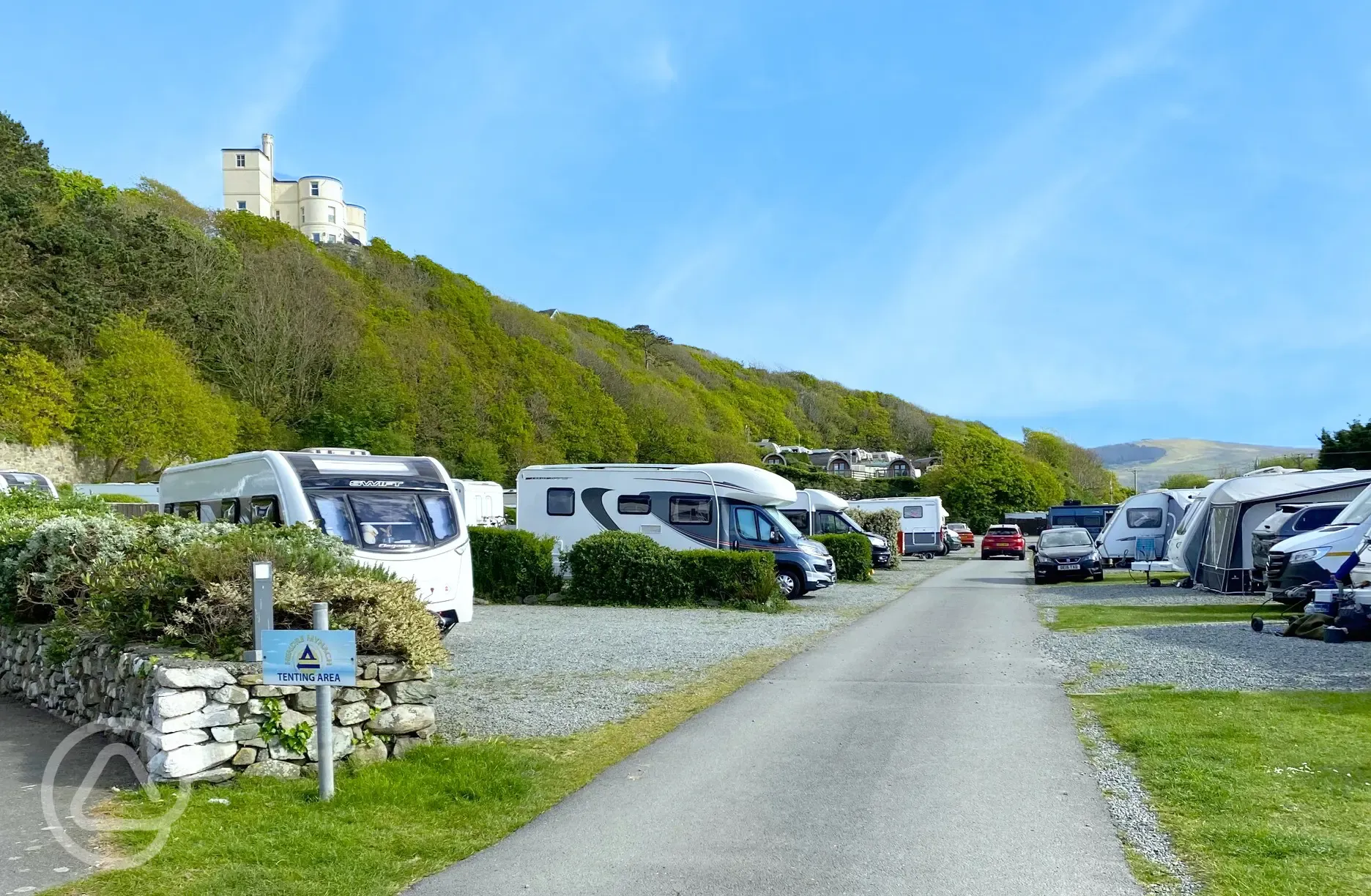 Hardstanding pitches (5m x 9m) with adjacent grass areas