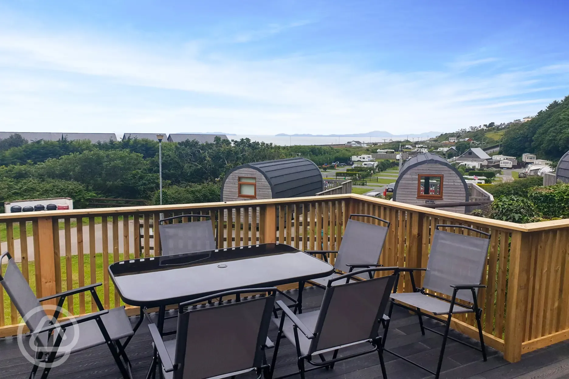 Gwel yr Bae large glamping pod decking area with sea views