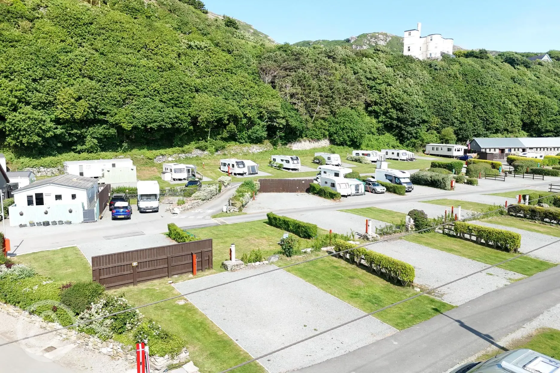 Aerial of the hardstanding pitches with grass areas and hedges