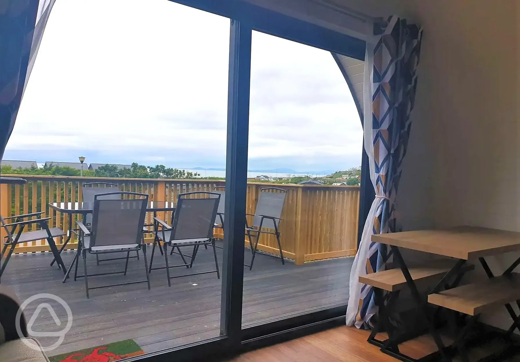 Gwel yr Bae large glamping pod glass front and decking