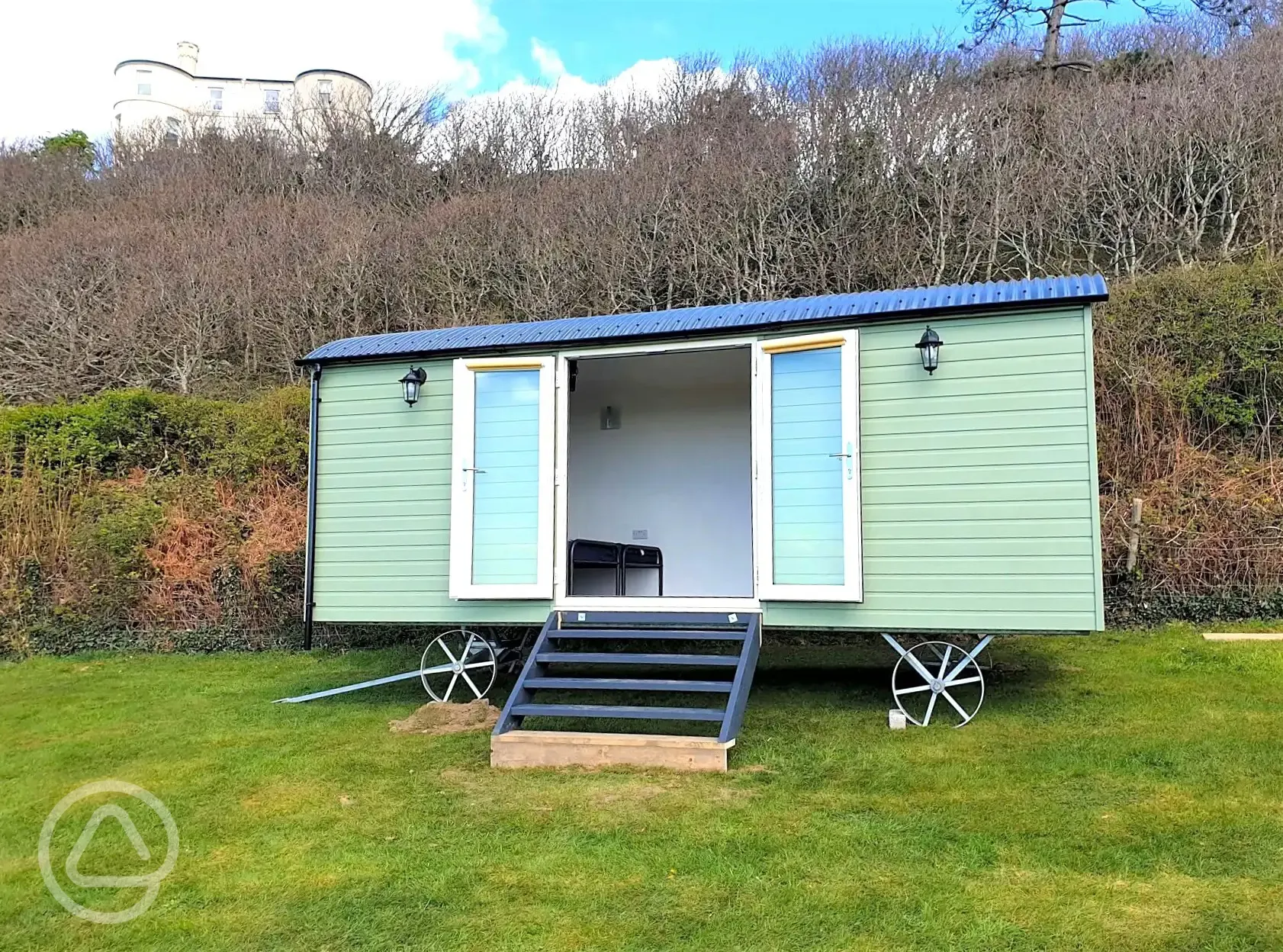 Shepherd's hut with small steps to the entrance