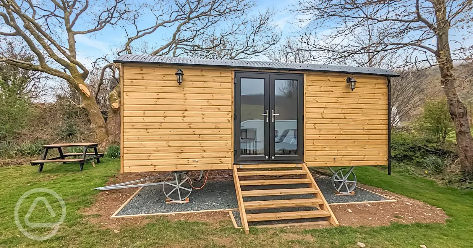 Shepherd's hut with outdoor seating