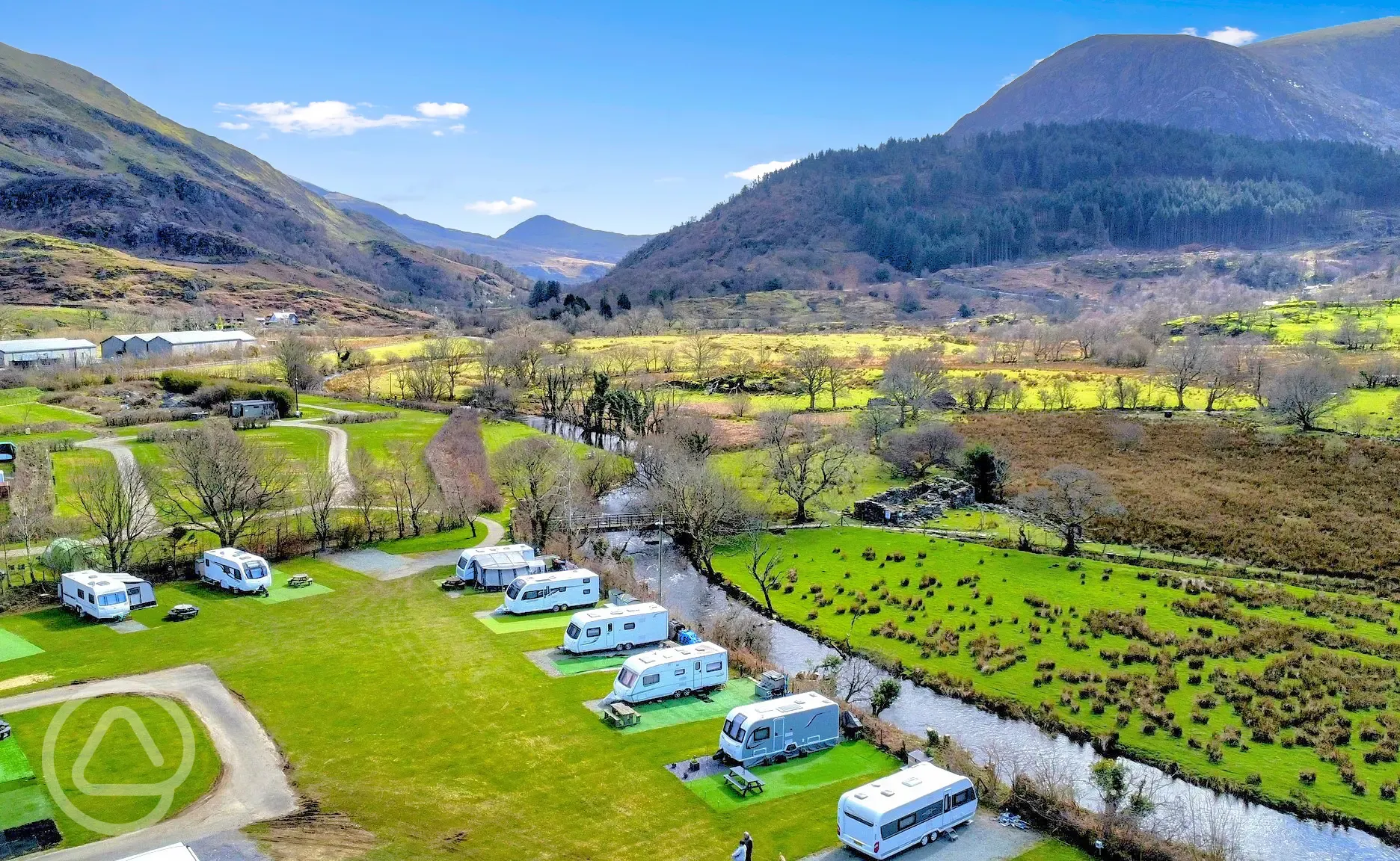 Aerial of the pitches onsite with views over Snowdonia National Park (Eryri) 