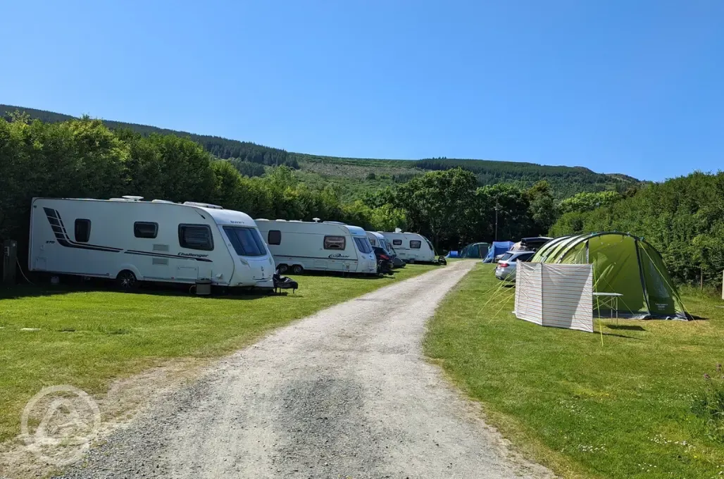 Electric grass pitches for tents and tourers
