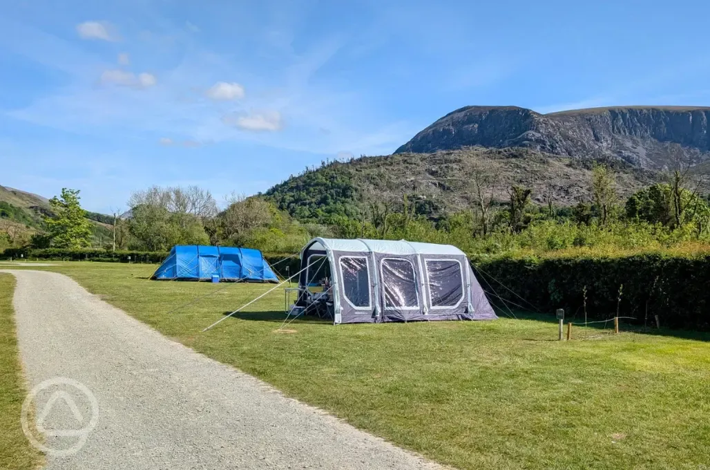 Large tents on the 6m x 7m grass pitches