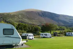 Hardstanding pitches with views of the mountains from Bryn Gloch