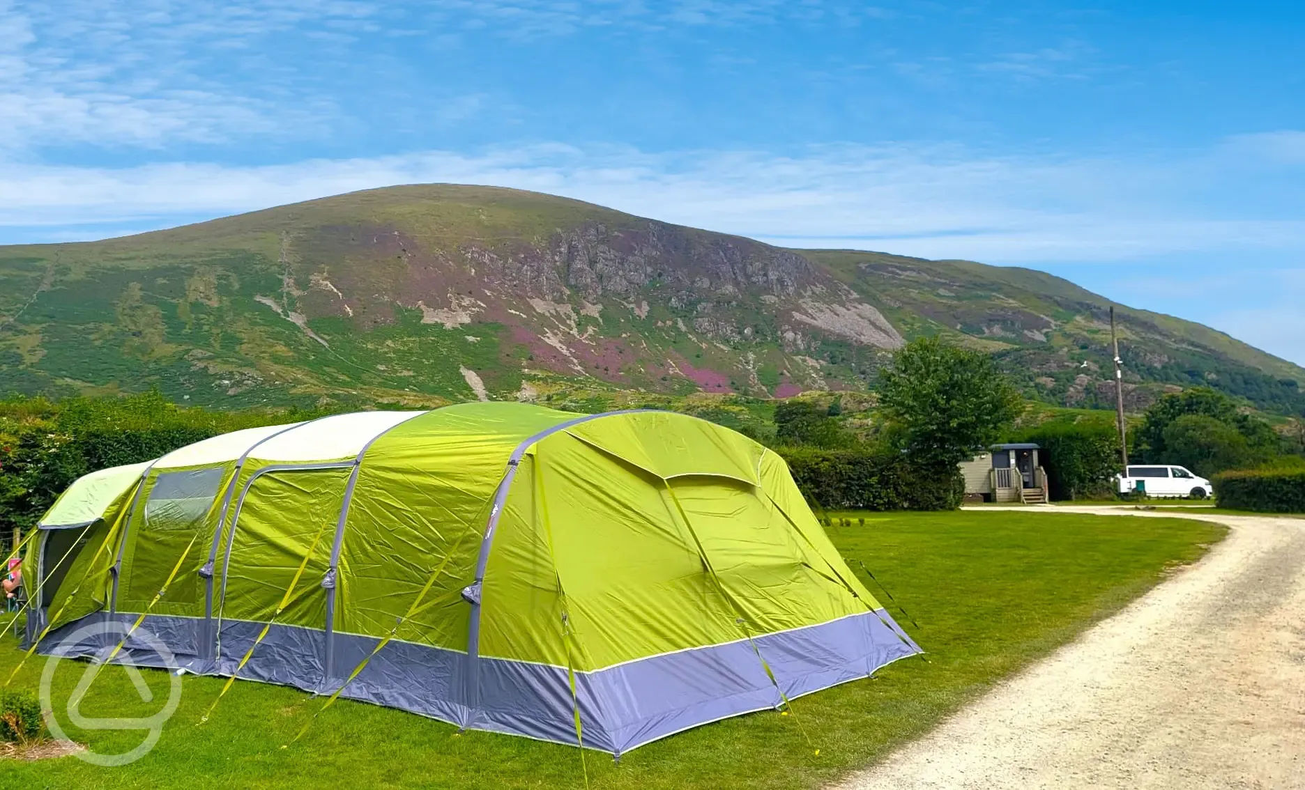 Large tents on the 6m x 7m grass pitches