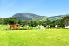 Electric grass pitches with views to Moel Eilio Mountain
