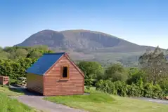 Camping pod (dog friendly) at Tyn-yr-Onnen Farm with distant Snowdonia views