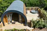 Aerial of the glamping pods with private hot tubs and deck areas