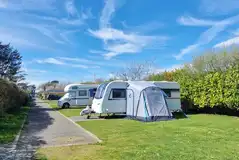Fully serviced hardstanding touring pitches (7.5m x 3m) Fully serviced hardstanding touring pitches (7.5m x 3m)